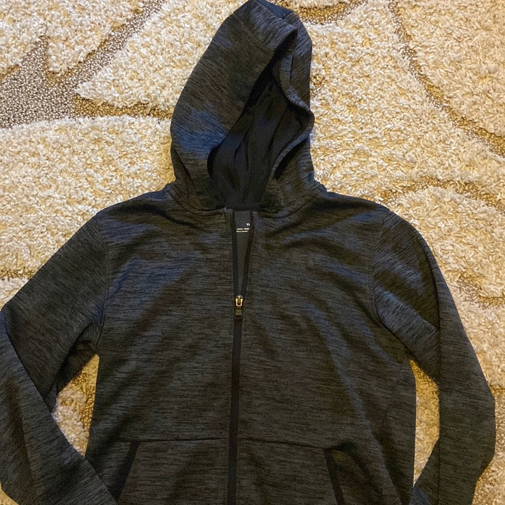 Heathered black full zip hoodie with single front pocket. Fleece lining.